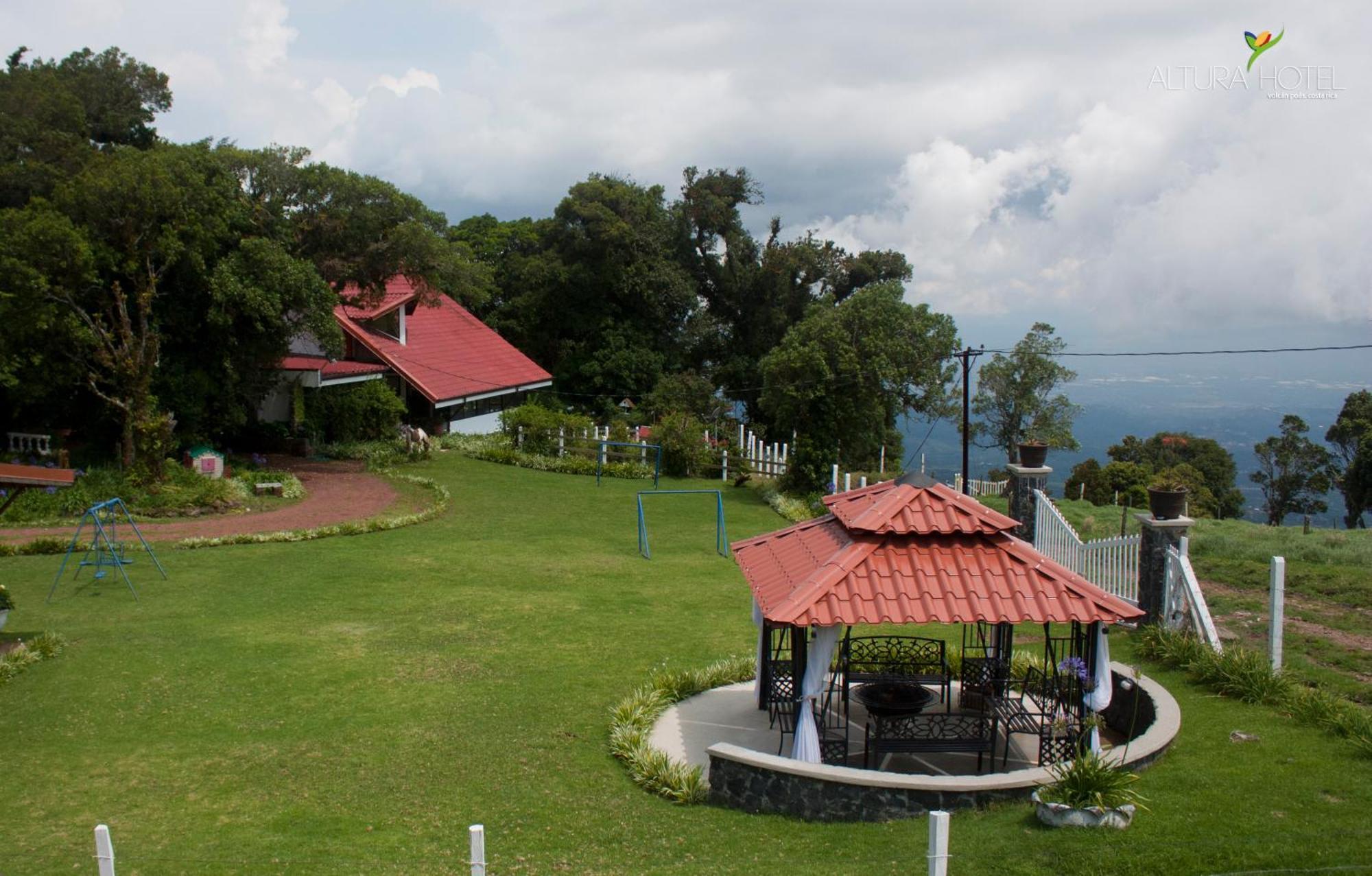 Altura Hotel Poasito Buitenkant foto